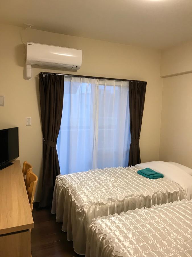 Weekly Harbourview Mansion Ginowan Appartement Buitenkant foto
